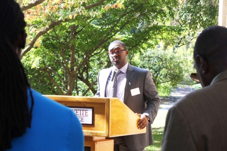 Robert Young ‘14, curator of the “Tales of Our Brothers” exhibit, speaks at the opening ceremony outside Pardee Hall.