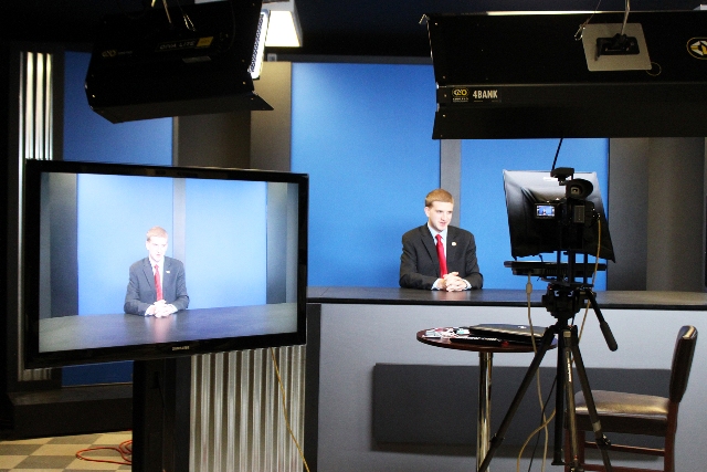 Ed O’Brien, President of Policy in Action, sits in the Conway basement studio, the headquarters of newly-founded LCTV.