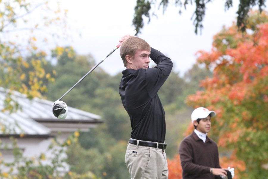 Chad Bell 17 stares down his drive. (Courtesy of Athletic Communications)