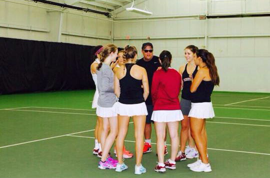 The women’s tennis team huddles up during practice to discuss technique [Photo Courtesy of Lafayette Athletic Communications]