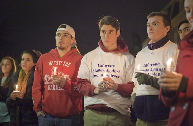 Students, faculty, and staff gathered at various locations around campus to participate in a silent march ending at the
Quad in Take Back the Night 2014 [Photo courtesy of Chuck Zovko, Communications Division]