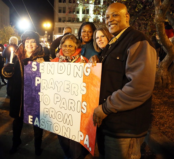 Easton Residents, including Rita Flowers (back), came to the vigil to support victims of the
attacks in Paris. [Photo by Christina Shaman ‘16]