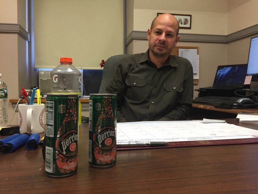 Professor Juan Rojo – on hunger strike and only consuming drinks – was given two drinks by President Alison Byerly, who signed off to deny him tenure. (Ian Morse '17)