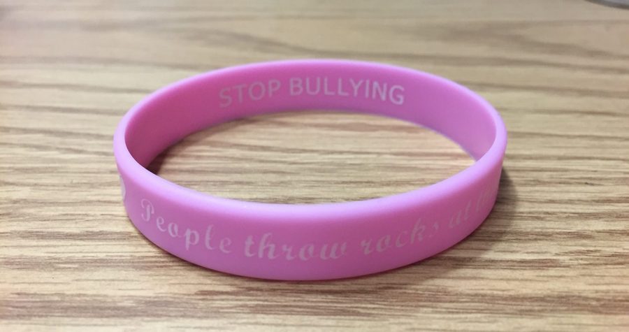 The bracelet handed out at Sarah Bramleys memorial service on campus. It reads People throw rocks at the things that shine. (Ian Morse 17)