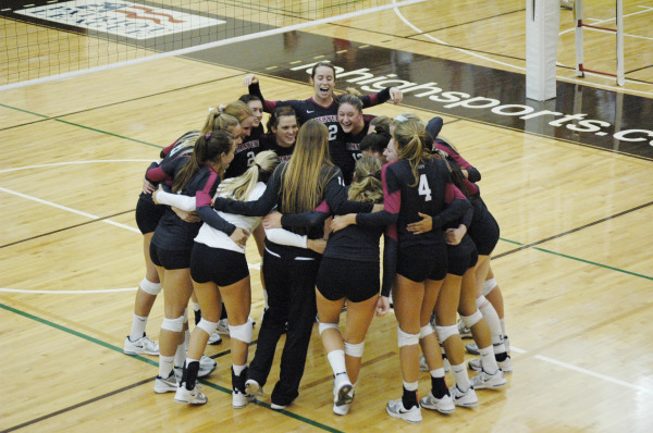The team huddles before a match against Lehigh earlier in the season. (Courtesy of Athletic Communications)