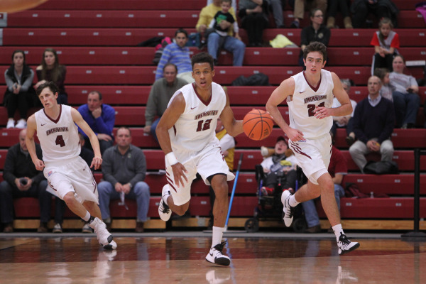 Auston Evans '19 dribbles the ball up-court (Courtesy of Athletic Communications).