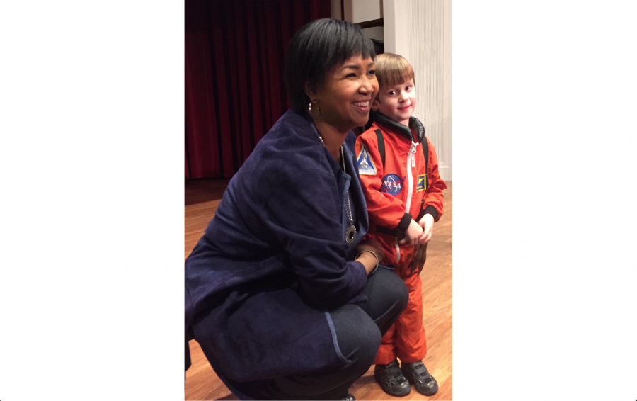 Dr. Mae Jemison and a boy dressed as an astronaut in Colton Chapel (Claire Grunewald 20)