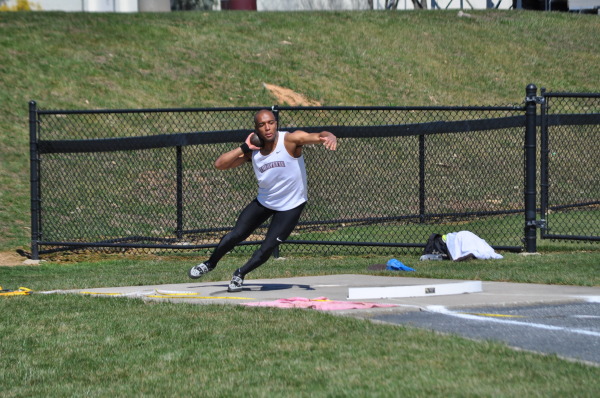 Dave McGriff 18 throws the shotput. (Courtesy of Athletic Communications)