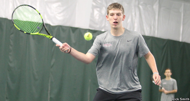 Noah Schott 20 hits the forehand. (Photo courtesy of Athletic Communications)