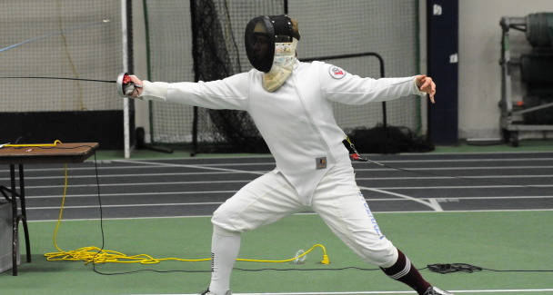 A member of the fencing team in a competition. (Courtesy of Athletic Communications)