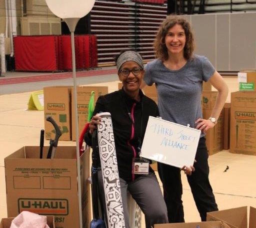 Sustainability Director Marie Fechik-Kirk with the Director of Homeless Services 
at Third Street Alliance during the colleges Green Move Out initiative. Photo Courtesy Marie Fechik-Kirk.