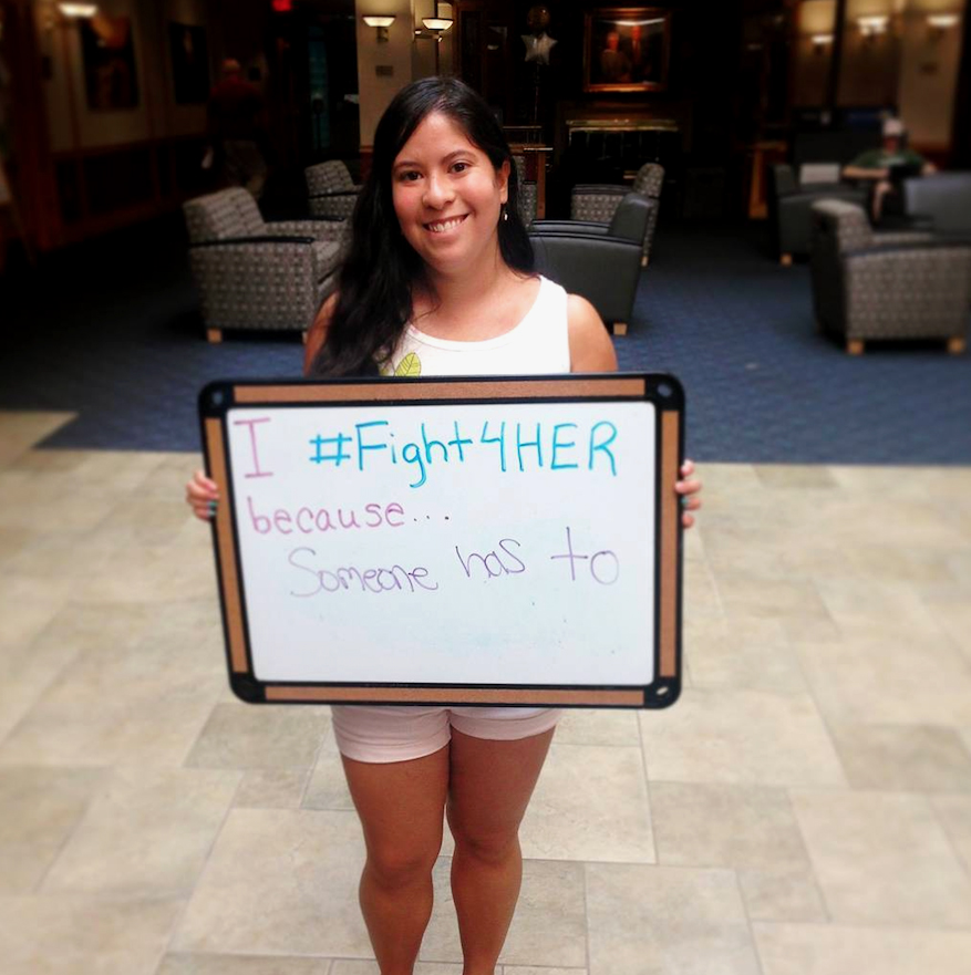 Alicia Rosenbaum ‘18 holds her #Fight4Her poster during the PPGen event (Courtesy of PPGenLafayette Instagram Account).