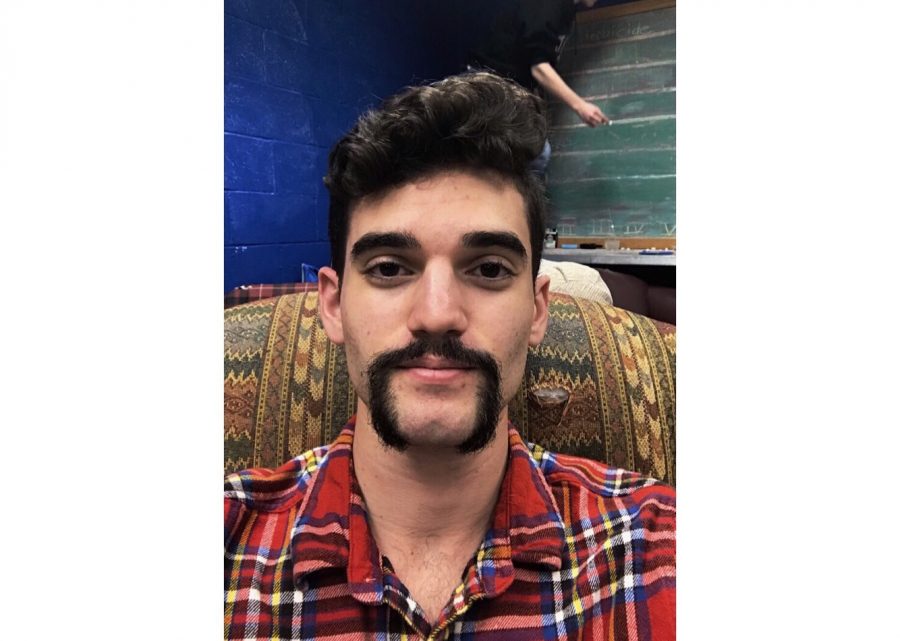 Matt Marchese '19 shows off his beard he grew during Movember. (Photo Courtesy of Cam Bartlett '18)