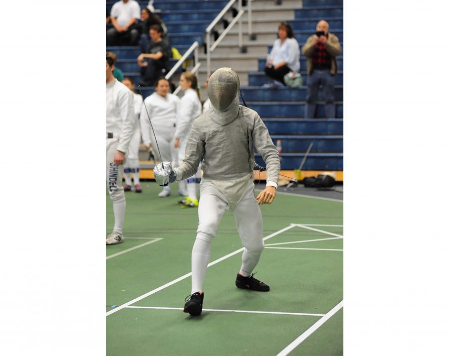 Senior fencer Alex Gorloff stands in position (Photo Courtesy of Athletic Communications)