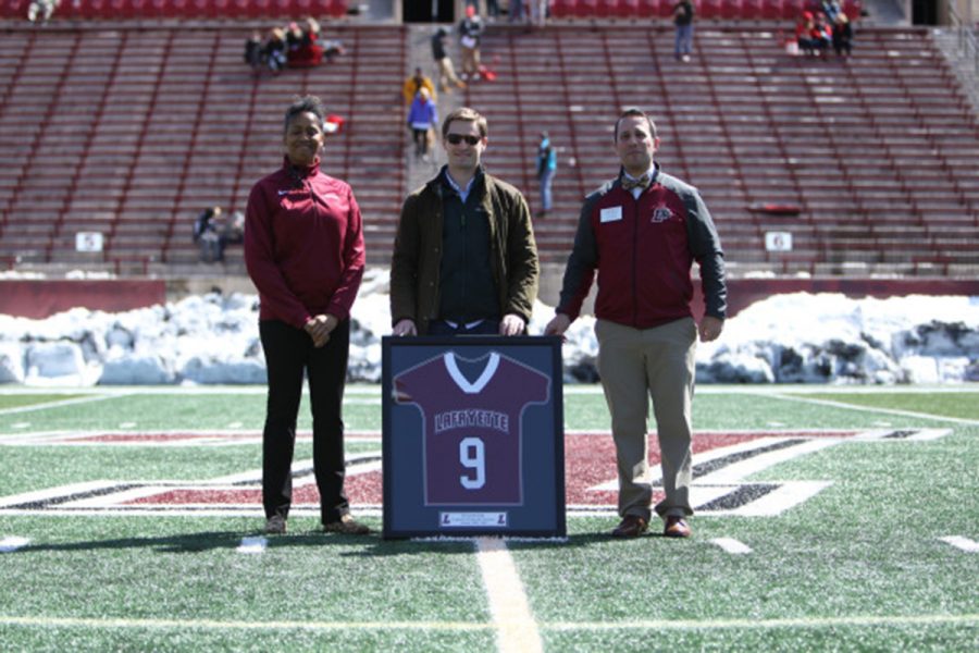 From left to right: Director of Athletics Sherryta Freeman, Director of Athletic Development Josh Azer, Kevin Bromby 01. Photo courtesy of Athletic Communications.