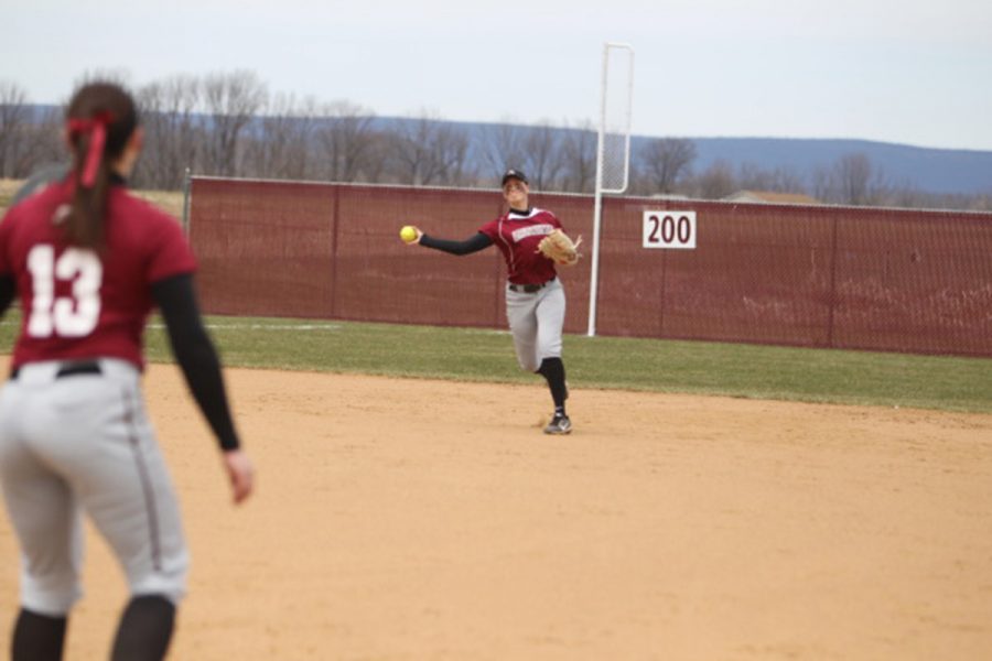 Junior Brooke Wensel throws to junior Maddie Wensel (no relation). (Photo courtesy of Athletic Communications)