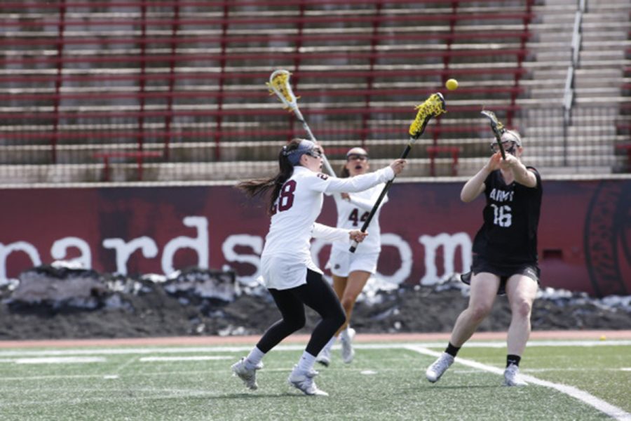 Junior attacker Emma Novick contests for the ball against Army. (Photo courtesy of Athletic Communications)