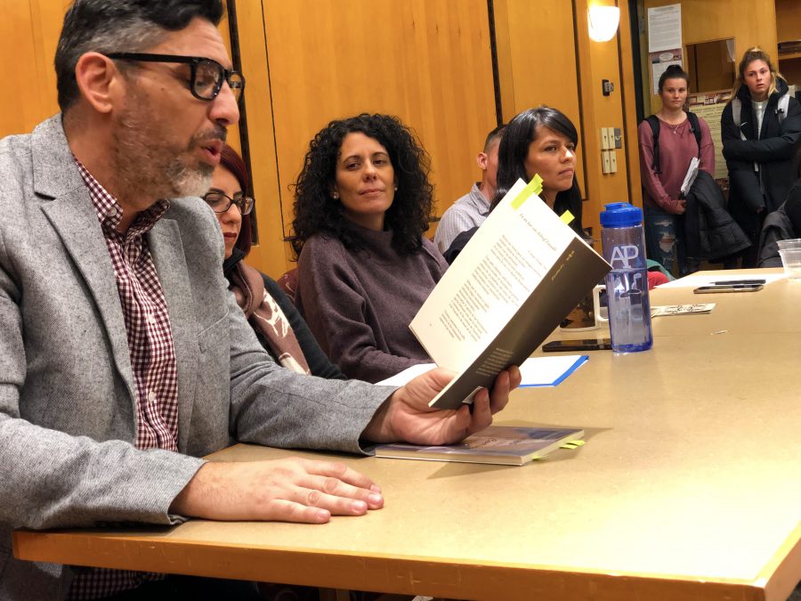 Poets each read four of their work at a reading hosted by the colleges foreign language department. (Photo by Mario Sanchez 21)