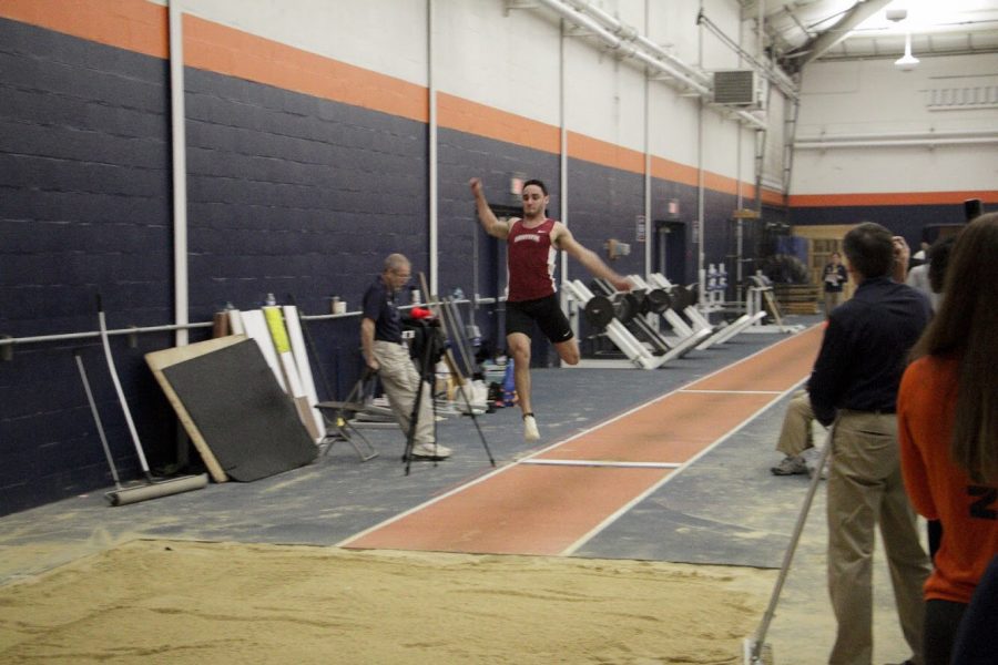 Sophomore Brian Kaufmann in full stride for the long jump. Kaufmann competes in both the long and triple jump events. (Photo Courtesy of Oscar Jopp 22) 
