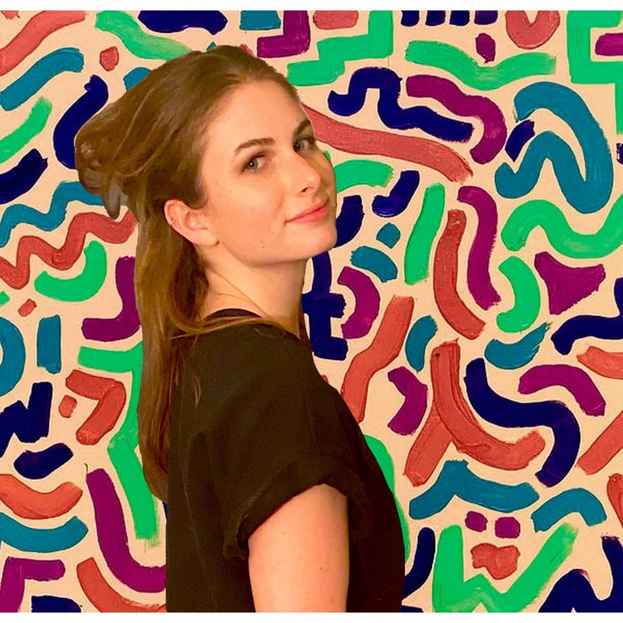 Gwen Goldman standing in front of a background full of colorful lines.