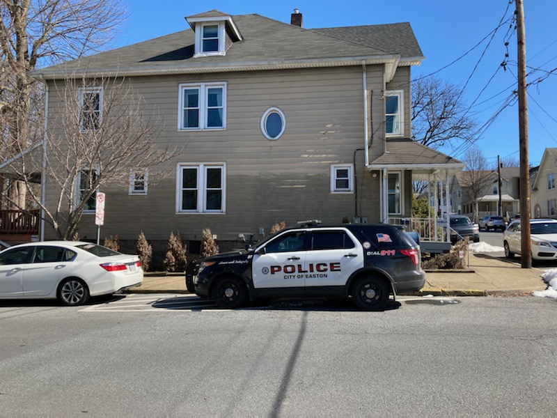 Police are stationed on the 400 block of McCartney and have yet to detain the individual(s) responsible for the break-in. (Photo by Andrew Hollander 21)