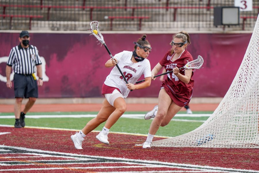 Junior+attacker+Olivia+Cunningham+%28left%29+turns+on+the+jets+against+a+Colgate+defender.+%28Photo+courtesy+of+Athletic+Communications%29