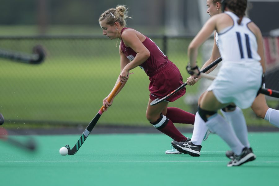 Womens field hockey player in action during the 2021-2022 season. (Photo courtesy of Athletic Communications)
