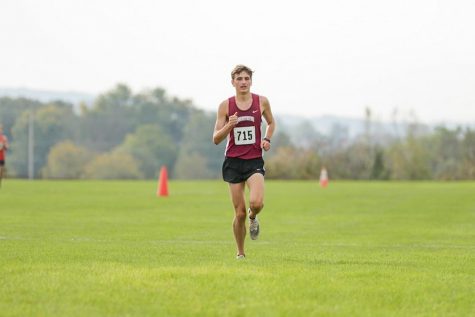Senior Brian Clayton (pictured) placed third out of 49 runners in the men’s individual 8k race. (Photo Courtesy of GoLeopards.com)