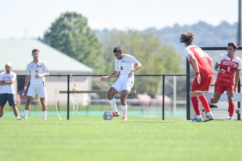 Junior midfielder Yiannis Panayides of Lafayette mens soccer puts ball past Terriers’ goalie’s for the game winning goal in overtime nail-biter against Boston. (Photo courtesy of Athletic Communications)