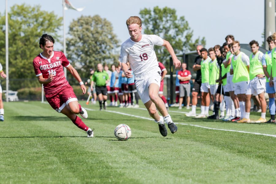 Sophomore Carter Houlihan handles the ball as the Leopards dominate in the battle against Colgate, holding them to just two shots on goal. (Photo courtesy of Athletic Communications)
