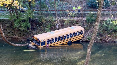The bus is partially submerged in the Bushkill Creek near the bridge that connects to the Karl Stirner Arts Trail. (Photo courtesy of WFMZ)
