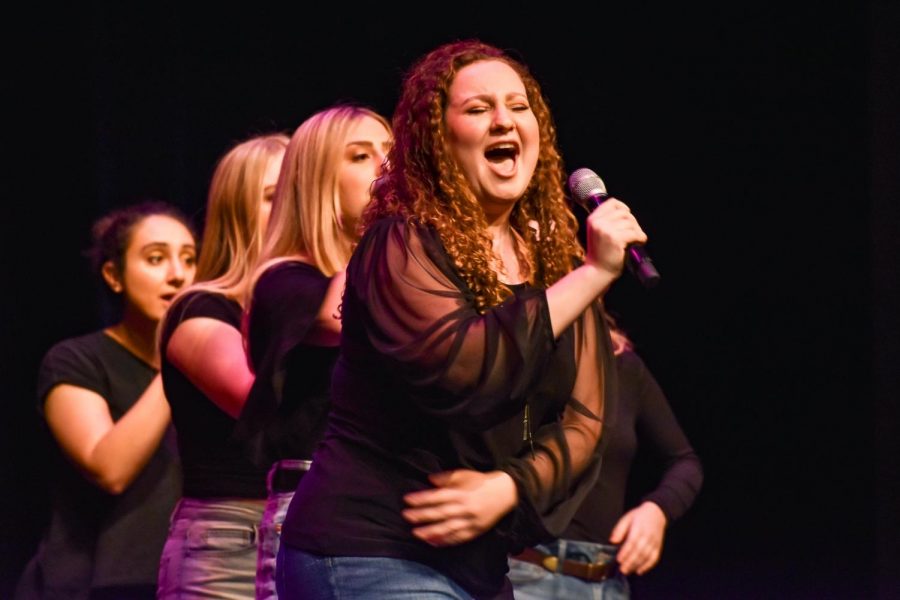 Meredith Forman '24 of Soulfege sang in one of the many student performances during the Evening of A Cappella. (Photo by Caroline Burns '22) 