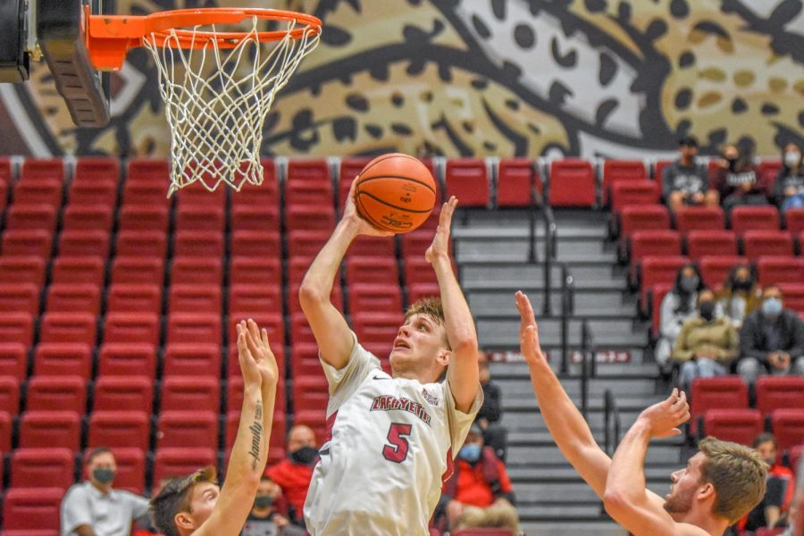Sophomore Eric Sondberg (pictured) shooting for a layup at Lafayette's first home game of the season against Colgate. (Photo by Cole Jacobson '24)