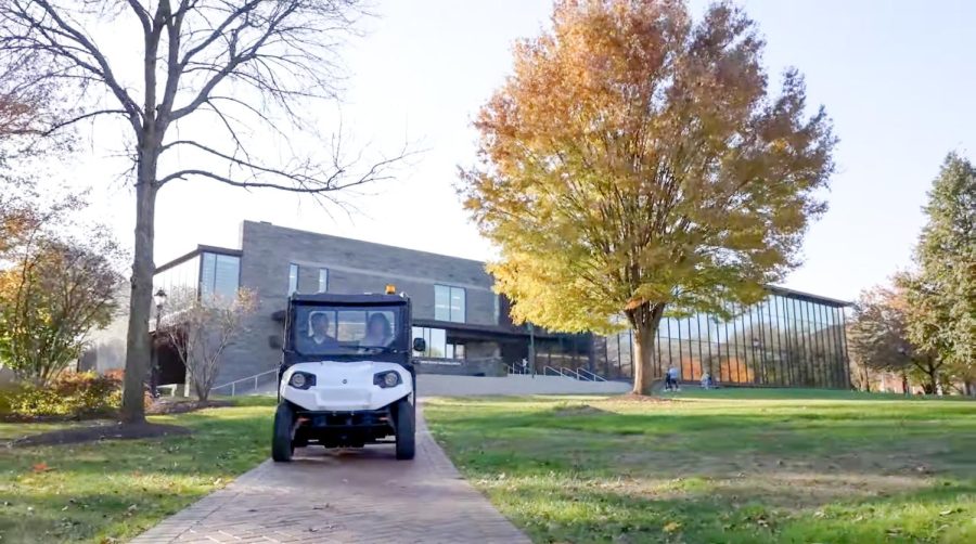 In the Need a Lift? web series, President Nicole Farmer Hurd drives through campus on a golf cart while interviewing guests. (Photo courtesy of the Lafayette YouTube)