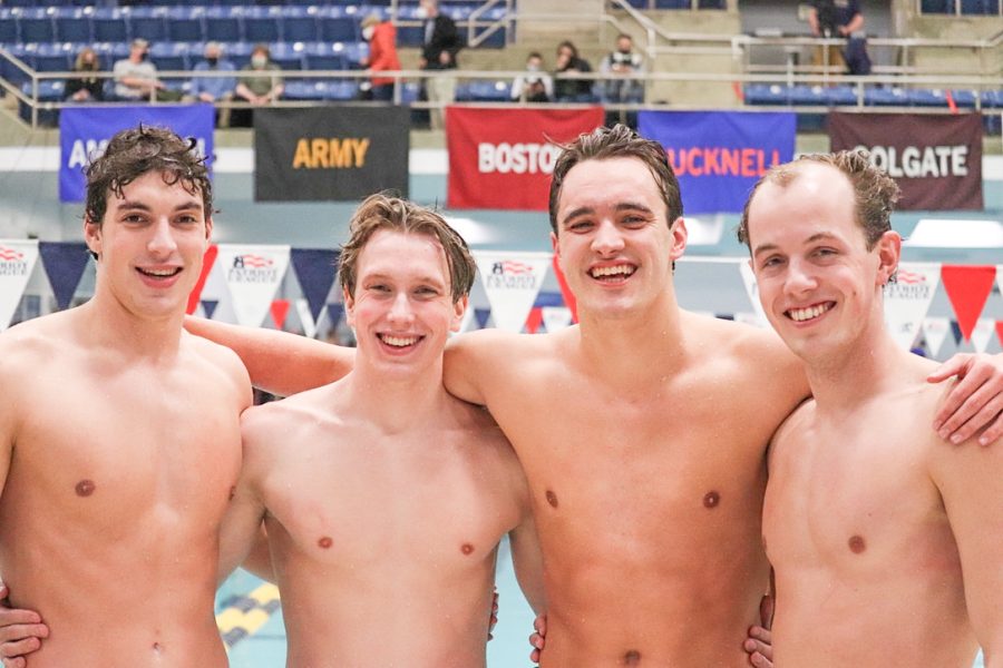 Freshmen+Antonio+Arena+and+Andrew+Campbell%2C+senior+Justin+Lloyd+and+junior+Aaron+Tupper+%28pictured+left+to+right%29+set+a+school+record+in+the+800-yard+relay+at+the+Patriot+League+Championships+last+week.+%28Photo+courtesy+of+Lindsey+Monaco+23%29