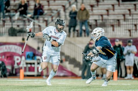 Men lacrosse drives to the crease against Binghamton in a heartbreaking overtime loss. (Photo courtesy of GoLeopards.com)