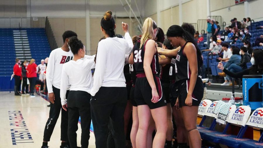 The womens basketball team huddles at halftime during their final regular season game against Loyola. (Photo courtesy of GoLeopards)