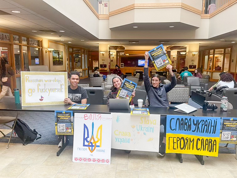 Students set up tables in the Farinon atrium last week to raise funds for the Razom Foundation Emergency Response Fund. (Photo by Deanna Hanchuk 22)