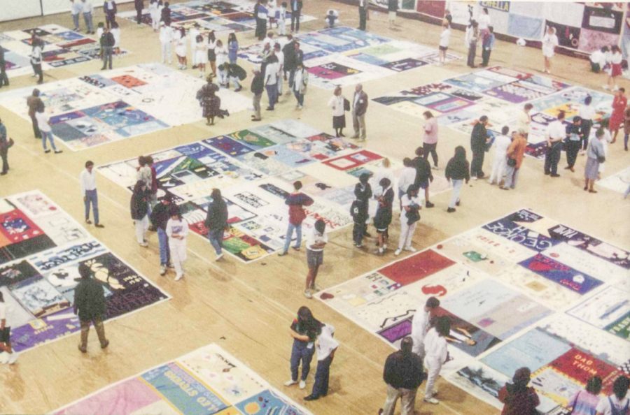 Students viewing the AIDS Memorial Quilt at Kirby Field House when it first came to Lafayette in 1992. (Photo courtesy of the Queer Archives Project)