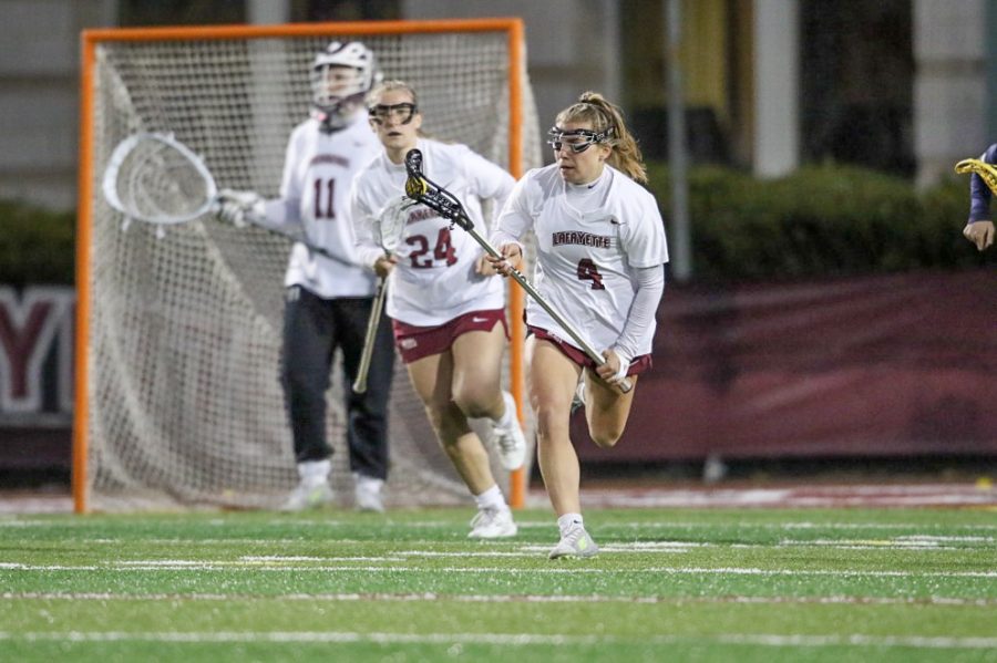 Freshman+defender+Lindsay+Geiger+takes+a+defensive+turnover+up+the+field+in+last+weeks+close+game+against+Colgate.+%28Photo+courtesy+of+GoLeopards%29