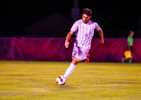 Senior forward Marcos Kitromilides dribbles past a defender during their win over Temple, in which he scored two of the three Lafayette goals. (Photo courtesy of GoLeopards)