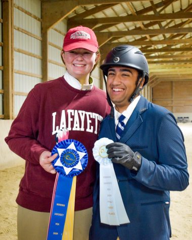 Juniors Grace McEneaney and Zubair Ali show off their first place ribbons this past weekend at the Moravian show. (Photo courtesy of Emma Sylvester 25)