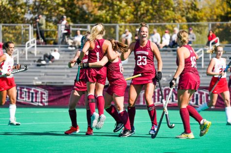 Senior Molly McAndrew is embraced by the team after she scores one of the Leopards two goals during their 2-0 win over BU. 
(Photo by Trent Weaver for GoLeopards)