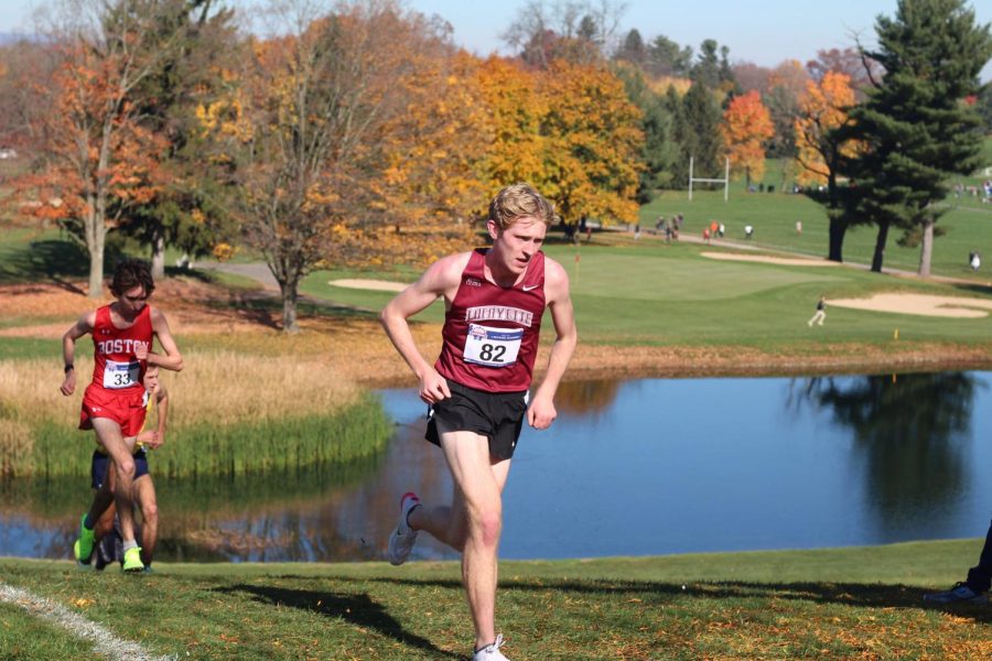 Senior+Bobby+Oehrlein+crests+the+steepest+hill+at+the+2022+Patriot+League+Cross+Country+Championships%2C+where+he+finished+11th.+%28Photo+courtesy+of+Nina+Koobatian+23%29