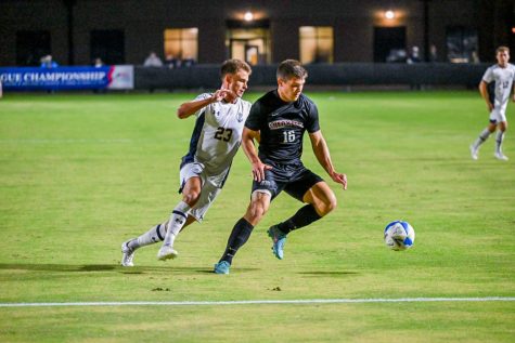 Senior midfielder Will Echeverria controls the ball during the Leopards 0-1 playoff loss. (Photo by Phil Hoffmann for Navy Athletics)