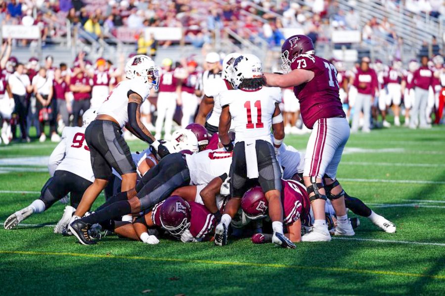 Fordham QB Tim DeMorant drives past the Lafayette defense to put up seven points during the Rams 45-10 win over the Leopards. 
(Photo by Christain Miccio for GoLeopards)
