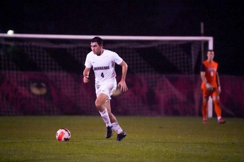 Senior midfielder Yiannis Panayides dribbles down the field during Lafayettes win against American. (Photo courtesy of GoLeopards)