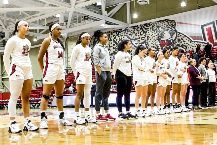 The womens basketball team before its first home game of the season against East Tennessee State. 
(Photo by Rick Smith for GoLeopards)