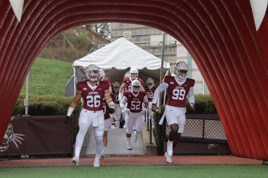 Seniors Marco Olivas and Malik Hamm lead the Leopards out of tunnel to take on Lehigh. 
(Photo by Rick Smith for GoLeopards). 