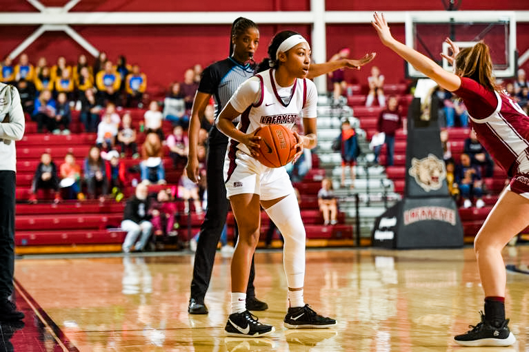 Freshman guard Sauda Ntaconayigize looks to pass during the Leopards loss to Boston. (Photo courtesy of GoLeopards)